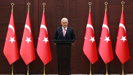 Le Premier ministre turc,&nbsp;Binali Yildirim, lors d'une conférence de presse sur l'accord passé avec Israël, le 27 juin 2016, à Ankara (Turquie).&nbsp; (ADEM ALTAN / AFP)