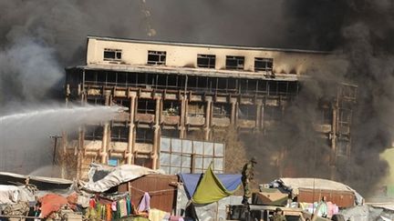 Plusieurs attaques ont eu lieu à Kaboul, le 18 janvier 2010. (AFP/SHAH MARAI)