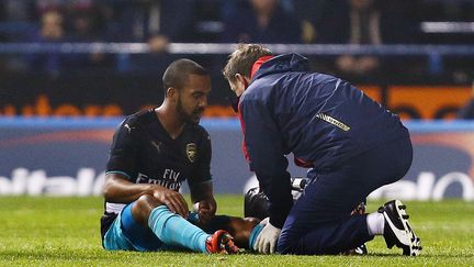 Theo Walcott, l'attaquant d'Arsenal, s'est blessé contre Sheffield Wednesay, en Coupe de la Ligue. (MATT WEST / BACKPAGE IMAGES LTD)