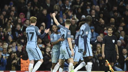 Le défenseur de Manchester City, John Stones, célèbre le 4e but de l'équipe contre Monaco, mardi 21 février à Manchester. (OLI SCARFF / AFP)