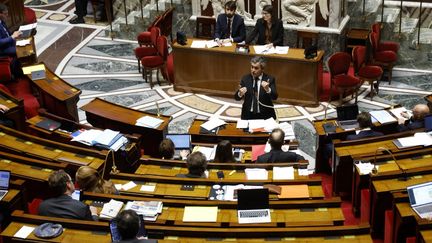 Le ministre de l'Intérieur Gérald Darmanin à l'Assemblée nationale à Paris, le 7 décembre 2023. (LUDOVIC MARIN / AFP)