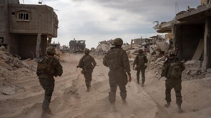 Des soldats israéliens dans la bande de Gaza, le 18 octobre 2024. (ISRAELI ARMY / AFP)