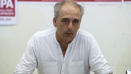 Philippe Poutou, le candidat du Nouveau parti  anticapitaliste (NPA) à la présidentielle (FRED DUFOUR / AFP)