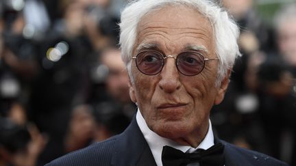 Après une nuit passé à danser la carioca, l'acteur Gérard Darmon a répondu présent pour la projection du film de son ami Claude Lelouch. (CHRISTOPHE SIMON / AFP)