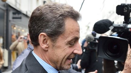 Nicolas Sarkozy, &agrave; Paris, apr&egrave;s avoir d&eacute;jeun&eacute; avec Fran&ccedil;ois Fillon, le 24 novembre 2012. (ERIC FEFERBERG / AFP)