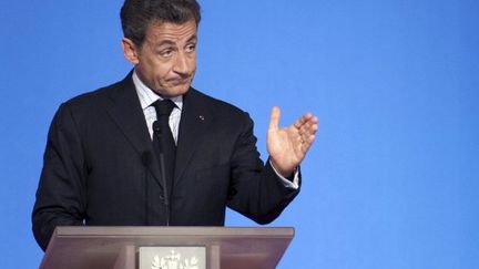 Nicolas Sarkozy enjoint la gauche à soutenir la "règle d'or budgétaire" au nom des comptes publics. (AFP / PHOTO FRED DUFOUR)