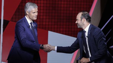 Laurent Wauquiez et Edouard Philippe sur le plateau de "L'Emission politique", le 27 septembre 2018.&nbsp; (GEOFFROY VAN DER HASSELT / AFP)