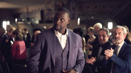 Omar Sy dans la série de Netflix "Lupin".&nbsp;Le 25 février 2022, une vingtaine de personnes cagoulées ont attaqué le tournage de la deuxième saison à Nanterre (Hauts-de-Seine).&nbsp; (MAXPPP)