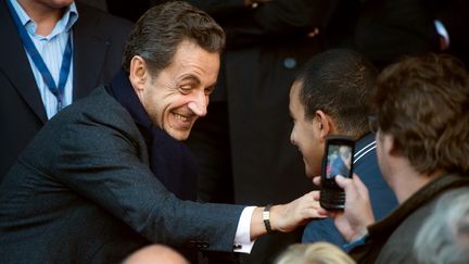 L'ancien pr&eacute;sident Nicolas Sarkozy assiste au match entre le PSG et Sochaux, le 29 septembre 2012 au Parc des Princes.&nbsp; (BERTRAND LANGLOIS / AFP)