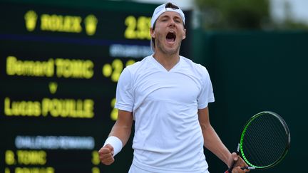 Pour la première fois de sa carrière, Lucas Pouille a été convoqué pour disputer la Coupe Davis. (GLYN KIRK / AFP)