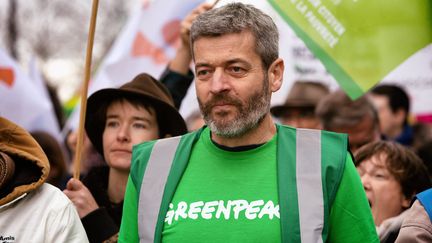 &nbsp;Jean-François Julliard, le directeur général de Greenpeace lors de la manifestation Look up à Paris le 12 mars 2022. (MARTIN NODA / HANS LUCAS)