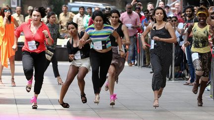 Des femmes participent &agrave; une course organis&eacute;e par la marque Elle &agrave;&nbsp;Bangalore (Inde) le 8 mars 2015. (MANJUNATH KIRAN / AFP)