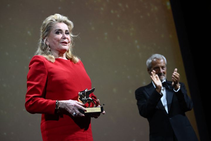 Actress Catherine Deneuve receives a Golden Lion of Honor at the 79th Venice Film Festival on August 31, 2022.   (MARCO BERTORELLO / AFP)