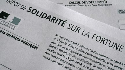 La taxe de l'Impôt de solidarité sur la fortune. (DAMIEN MEYER / AFP)