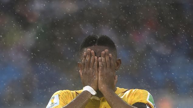&nbsp; (Samuel Eto'o sous une pluie battante © REUTERS)