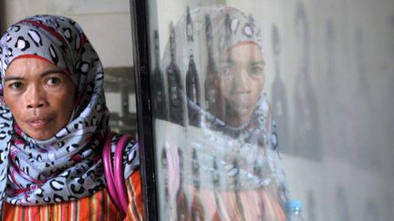 Une cambodgienne musulmane au musée du génocide de Tuol Sleng à Phnom Penh, le 15 octobre 2014. (AFP PHOTO/ TANG CHHIN SOTHY)