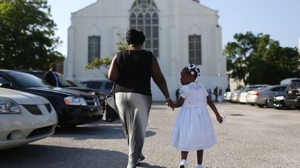 En m&eacute;moire aux victimes, les cloches d'une vingtaine d'&eacute;glises de Charleston et des environs ont sonn&eacute;, tout comme des dizaines d'autres aux Etats-Unis. (JOE RAEDLE / GETTY IMAGES NORTH AMERICA)