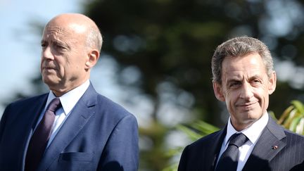 Alain Juppé et Nicolas Sarkozy à La Baule (Loire-Atlantique), le 5 septembre 2015. (JEAN-SEBASTIEN EVRARD / AFP)