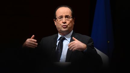 Fran&ccedil;ois Hollande lors de ses v&oelig;ux &agrave; la jeunesse, le 23 janvier 2013, &agrave; Grenoble (Is&egrave;re). (PHILIPPE DESMAZES / AFP)