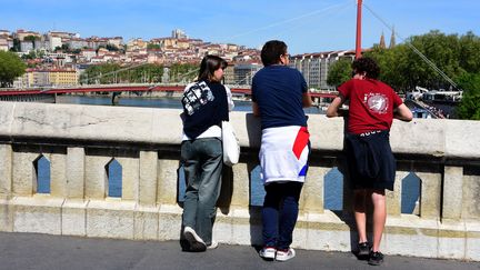 Passers-by in the streets of Lyon, April 13, 2024. (ROMAIN DOUCELIN / HANS LUCAS / AFP)