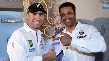 Stéphane Peterhansel et Nasser Al-Attiyah ensemble chez Mini (FRANCK FIFE / AFP)