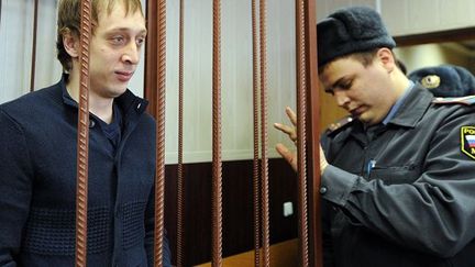 Pavel Dmitrichenko, danseur du Théâtre du Bolchoï au tribunal de Moscou, le 16 Avril 2013.
 (ANDREY SMIRNOV / AFP)