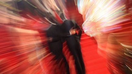 La montée des marches sous les flashes au Festival de Cannes
 (VALERY HACHE / AFP)