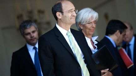 Le ministre du Travail, Eric Woerth, à côté de la ministre de l'Economie, Christine Lagarde le 3 août 2010 (AFP - MARTIN BUREAU)