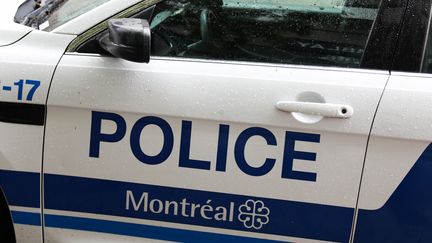 A police car in Montreal, June 13, 2023. Illustrative photo.  (JAKUB PORZYCKI / AFP)