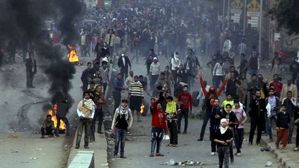 Des partisans des Fr&egrave;res musulmans, lors d'une manifestation, le 20 d&eacute;cembre 2013 au Caire (Egypte). ( REUTERS)