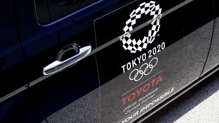 Un taxi olympique officiel de Toyota à Tokyo, le 20 juillet 2021.&nbsp; (KOEN VAN WEEL / AFP)