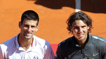 Rafael Nadal et Novak Djokovic le 22 avril 2012 &agrave; Monaco. (VALERY HACHE / AFP)