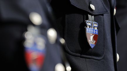 Le logo des policiers de la préfecture de Paris. (THOMAS SAMSON / AFP)