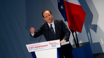 Fran&ccedil;ois Hollande, en mars 2012, lors d'un meeting &agrave; Paris. (MARTIN BUREAU / AFP)