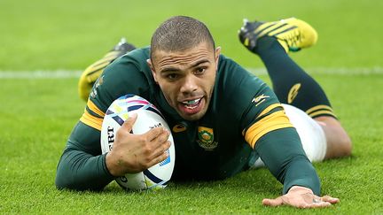 L'ailier sud-africain Bryan Habana marque un essai lors du match de poules de la Coupe du monde de rugby contre les Etats-Unis, le 7 octobre 2015 à Londres (Royaume-Uni). (JAN HENDRIK KRUGER / GETTY IMAGES EUROPE)