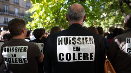 &nbsp; (Manifestation des huissiers à Paris le 15 septembre 2014 © MaxPPP)