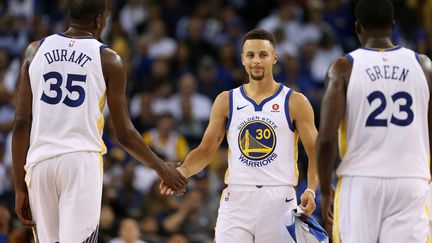 Les stars de Golden State Curry, Durant et Green (EZRA SHAW / GETTY IMAGES NORTH AMERICA)