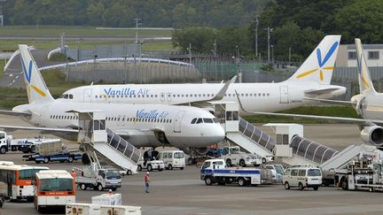 Des avions de la compagnie Vanilla Air à Tokyo (Japon), en mai 2014.&nbsp; (MAXPPP)