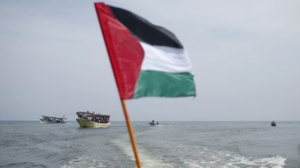 Des activistes comm&eacute;morent le 4e anniversaire de l'incident de la flottille qui tentait de forcer le blocus de Gaza, le 31 mai 2010.&nbsp; ( MOHAMMED SALEM / REUTERS)