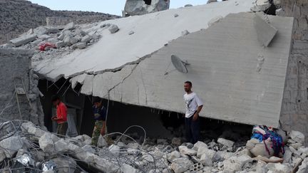 Les premi&egrave;res frappes a&eacute;riennes contre l'Etat islamique en Syrie ont eu lieu le 23 septembre 2014, notamment dans le village de Kfar Derian, dans les environs d'Alep. (SAMI ALI / AFP)