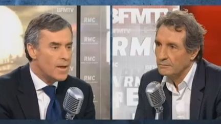 L'ex-ministre du Budget J&eacute;r&ocirc;me Cahuzac et le journaliste Jean-Jacques Bourdin sur BFMTV le 8 f&eacute;vrier 2013. (FRANCETV INFO)