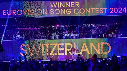 La Suisse gagne le concours de l'Eurovision le 11 mai 2024. C'est elle qui doit abriter le concours en 2025 (TOBIAS SCHWARZ / AFP)