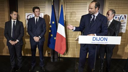 Le Premier ministre Edouard Philippe, accompagné de Gérald Darmanin et Benjamin Griveaux, à la chambre de commerce de Dijon (Côte d'Or), le 5 septembre 2017.&nbsp; (JEAN-PHILIPPE KSIAZEK / AFP)