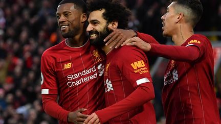 La joie de Wijnaldum, Salah et Firmino (Liverpool) (PAUL ELLIS / AFP)