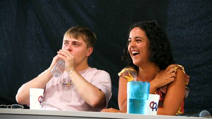 Le deputé Louis Boyard et la deputé europeenne Manon Aubry aux "AMFIS", près de Valence (Drôme), août 2023. (NICOLAS GUYONNET / HANS LUCAS)