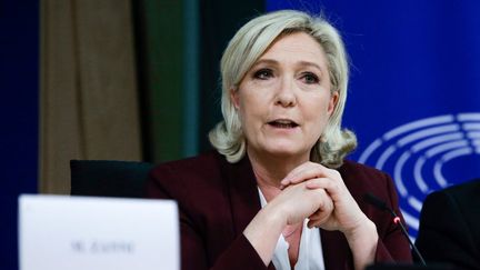 Marine Le Pen, alors présidente du Rassemblement national, lors d'une conférence de presse au Parlement européen à Bruxelles, le 13 juin 2019. (ARIS OIKONOMOU / AFP)