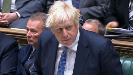 Le Premier ministre britannique, Boris Johnson, répond aux questions des parlementaires à la Chambre des communes, le 25 mai 2022 à Londres (Royaume-Uni).&nbsp; (PRU / AFP)