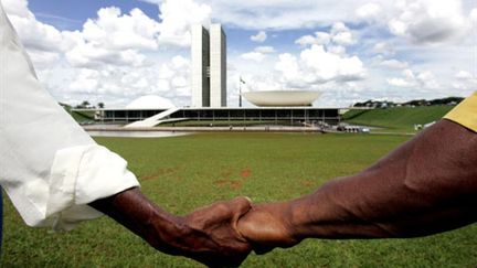 Des membres d'un mouvement social brésilien manifestent contre l'esclavage devant le Congrès à Brasilia - 12/03/08 (AFP Evaristo SA)