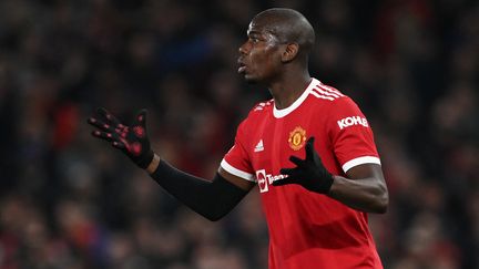 Le milieu de terrain français de Manchester United, Paul Pogba, lors du&nbsp;huitième de finale retour de Ligue des champions contre l'Atlético de Madrid, le 15 mars 2022, à Manchester (Angleterre). (PAUL ELLIS / AFP)