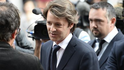 Le d&eacute;put&eacute; UMP Fran&ccedil;ois Baroin arrive au QG de l'UMP pour une r&eacute;union avec les cadres du parti, le 10 juin 2014 &agrave; Paris.&nbsp; (ERIC FEFERBERG / AFP)